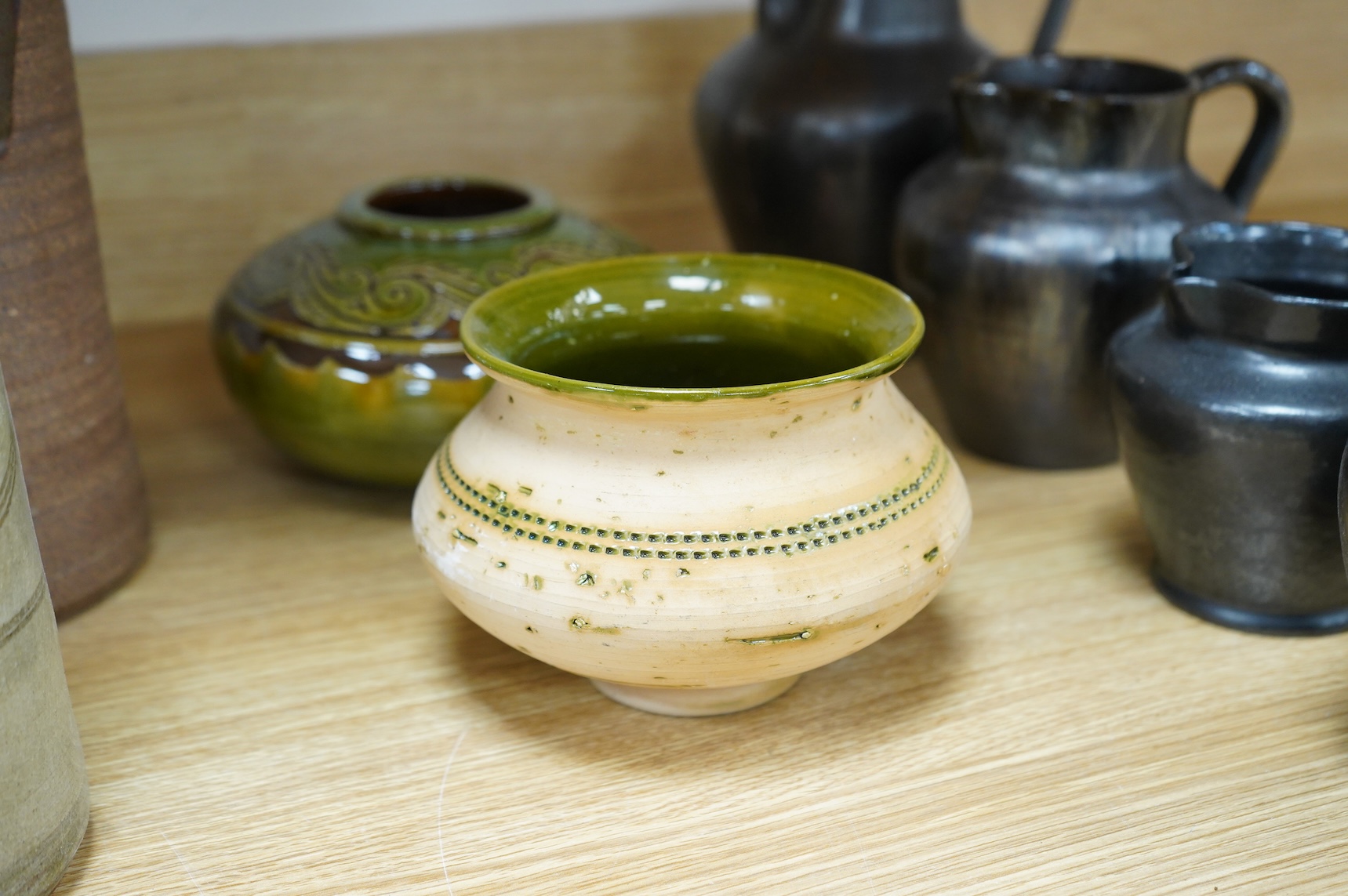 A collection of mixed mid to late 20th century pottery, including a group of Dickerware pottery jugs